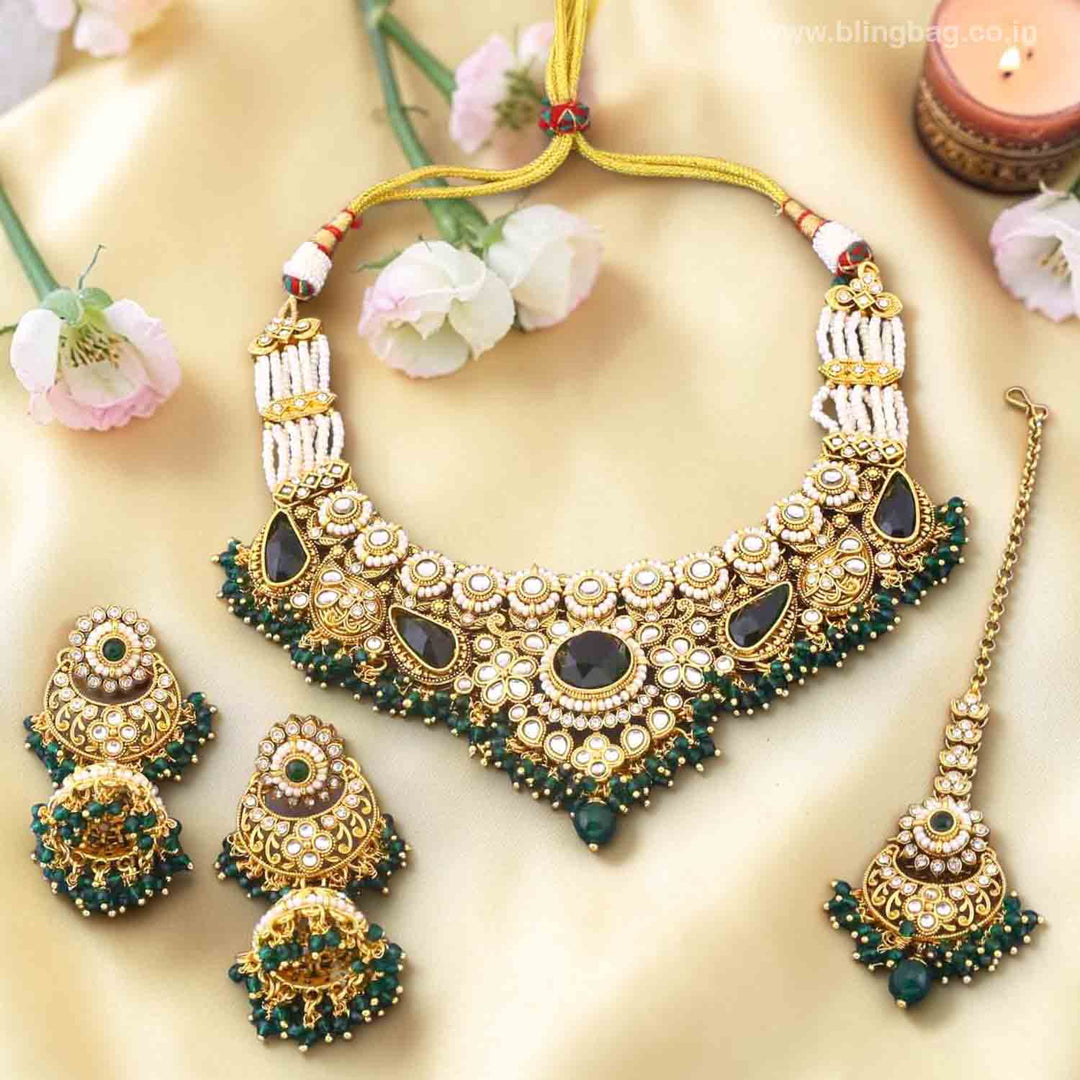 Emerald Selvi Kundan Jewellery Set