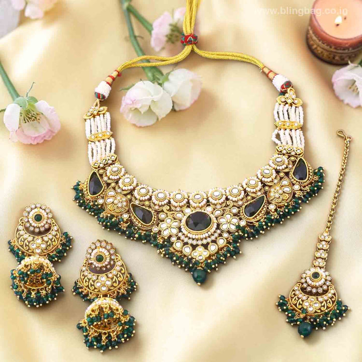 Emerald Selvi Kundan Jewellery Set