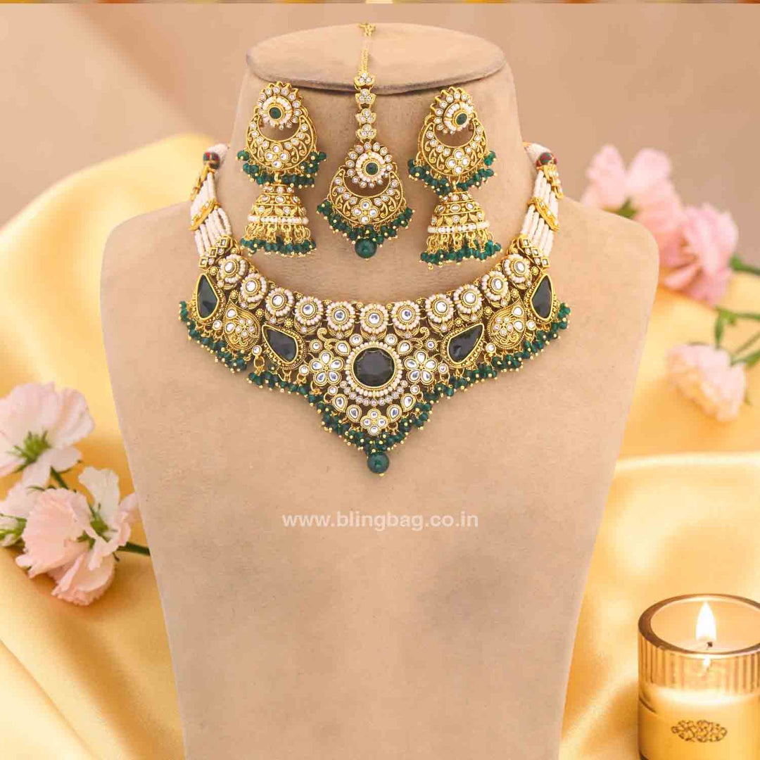 Emerald Selvi Kundan Jewellery Set