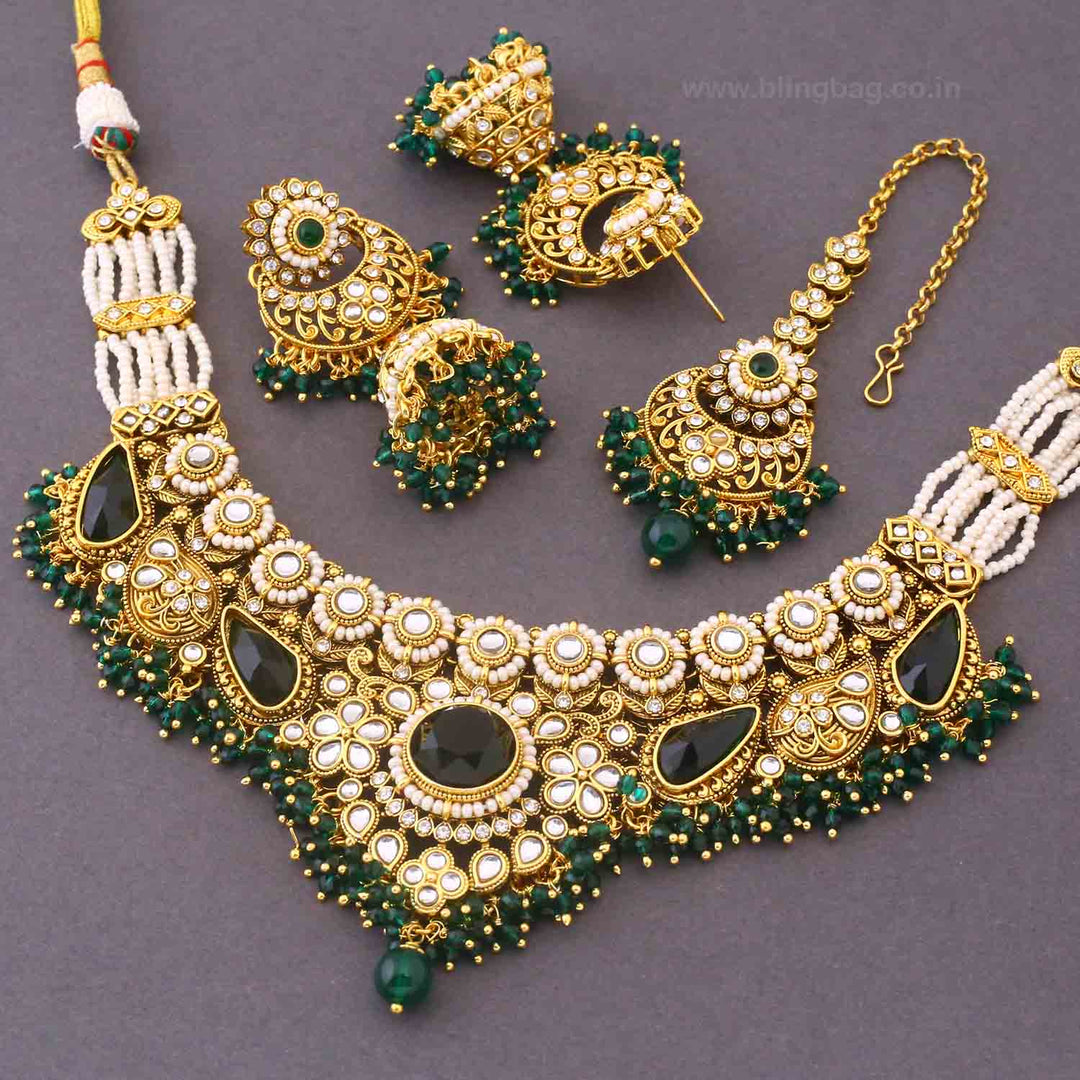 Emerald Selvi Kundan Jewellery Set