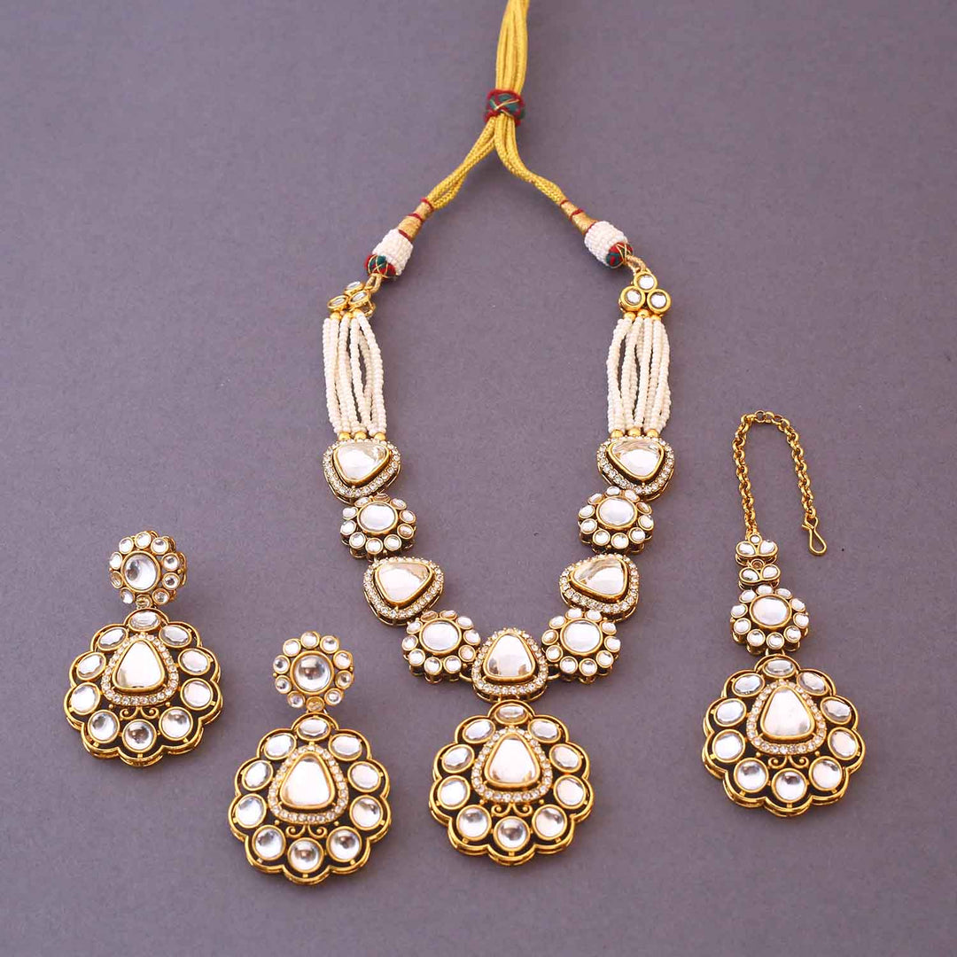 Ivory Dhivyashi Kundan Jewellery Set