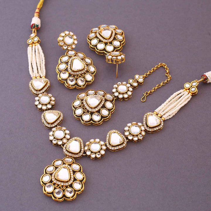 Ivory Dhivyashi Kundan Jewellery Set