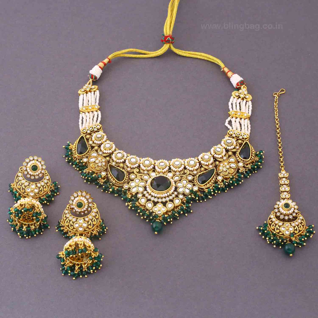 Emerald Selvi Kundan Jewellery Set