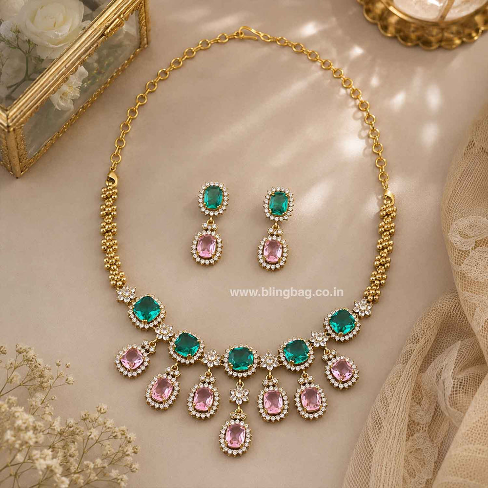 Emerald green and blush pink Victorian necklace set with matching gold-toned drop earrings